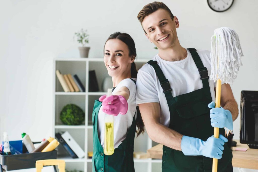 Cleaners using eco-friendly cleaning products in an office